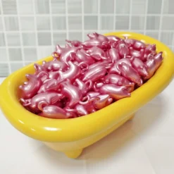 Caja 40 Perlas De Baño Con Aroma A Rosas - Con Aceite De Soja - Hidratante Y Aromática - Forma Cerdito