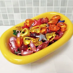 80 Perlas De Baño De Formas Variadas - Con Aceite De Soja - Hidrata, Suaviza Y Perfuma La Piel - Aroma Varios