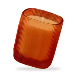 Vela perfumada Oriental Oud en vaso rayado naranja 9x8 cm Roura