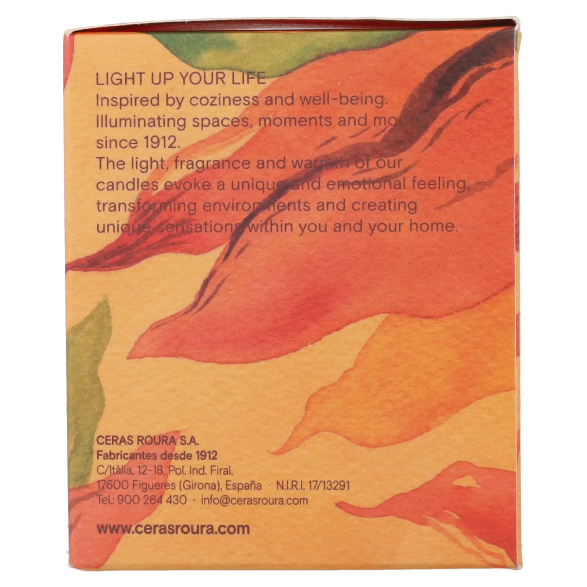 Vela perfumada Oriental Oud en vaso rayado naranja 9x8 cm Roura