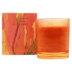 Vela perfumada Oriental Oud en vaso rayado naranja 9x8 cm Roura